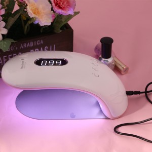 La mujer puede sostener la mitad de la lámpara de terapia de luz del cielo Rainbow 2